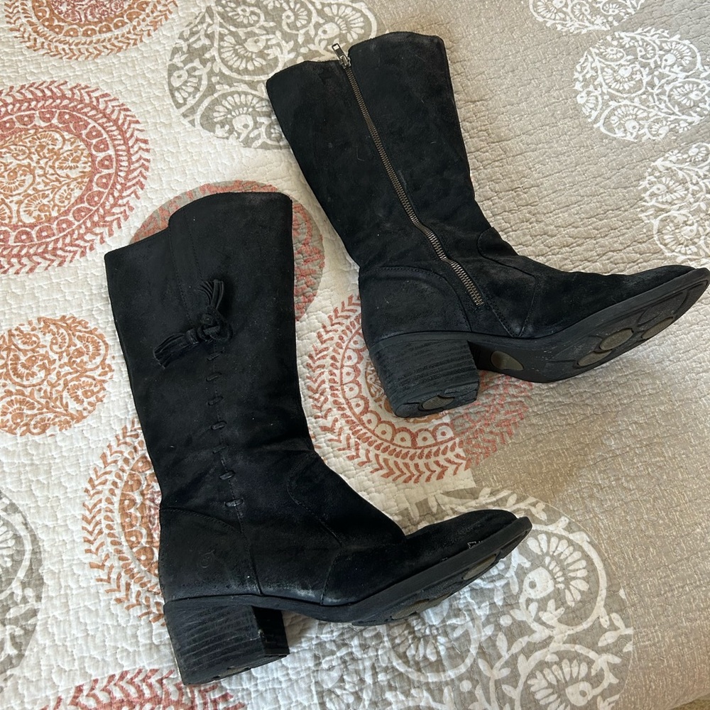 Born black distressed tall boot. Tassel detail